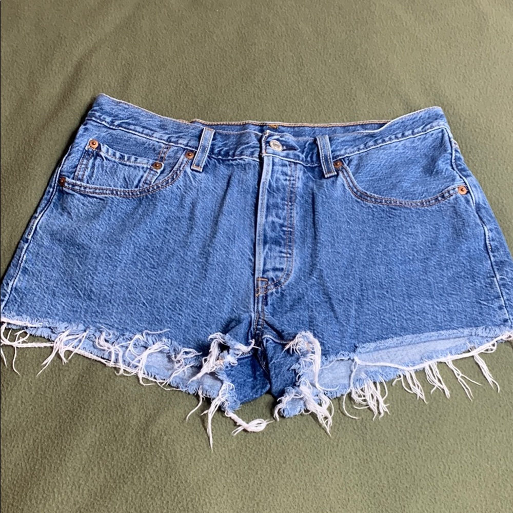 Levi’s 501 button fly shorts. Waist 31”. Inseam approximately 2”.